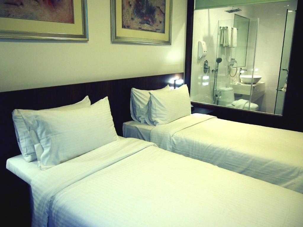 Aparthotel Cove D'Arena Singapur Zimmer foto