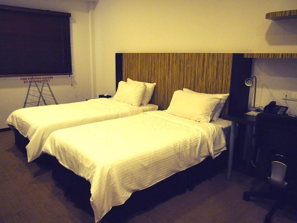 Aparthotel Cove D'Arena Singapur Zimmer foto