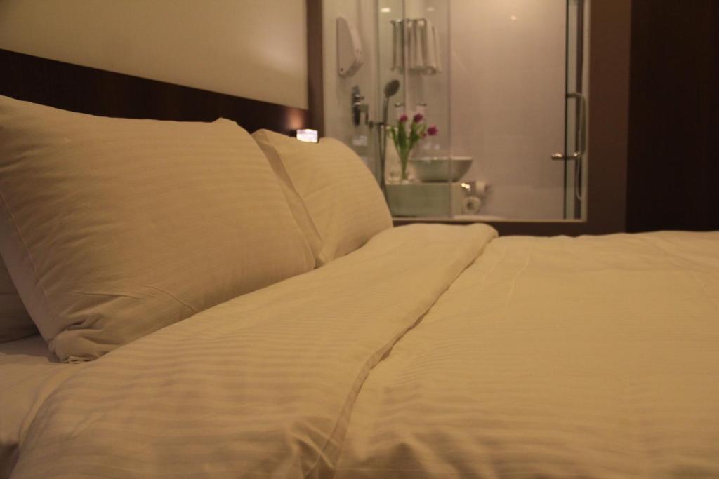Aparthotel Cove D'Arena Singapur Zimmer foto