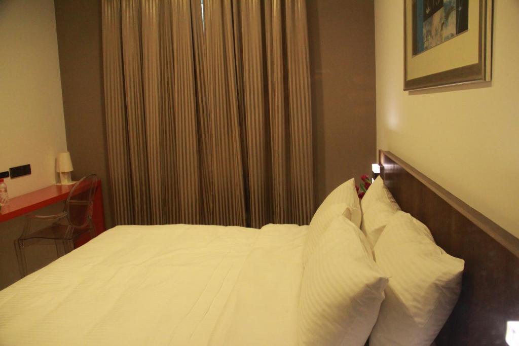 Aparthotel Cove D'Arena Singapur Zimmer foto