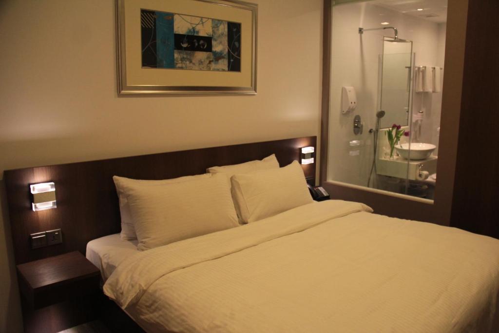 Aparthotel Cove D'Arena Singapur Zimmer foto
