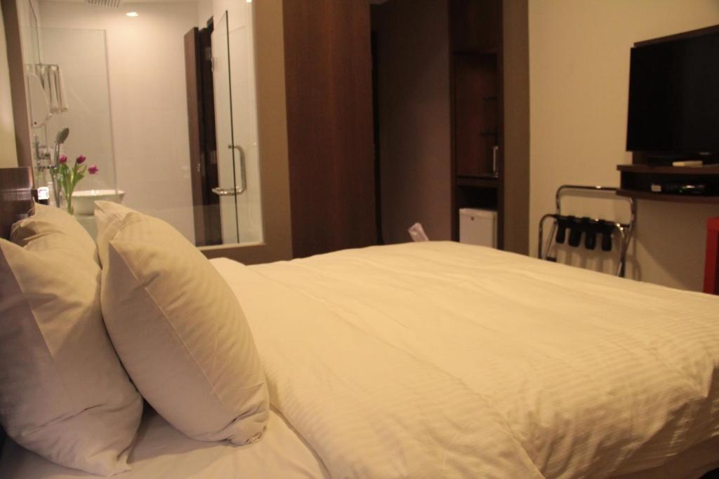Aparthotel Cove D'Arena Singapur Zimmer foto